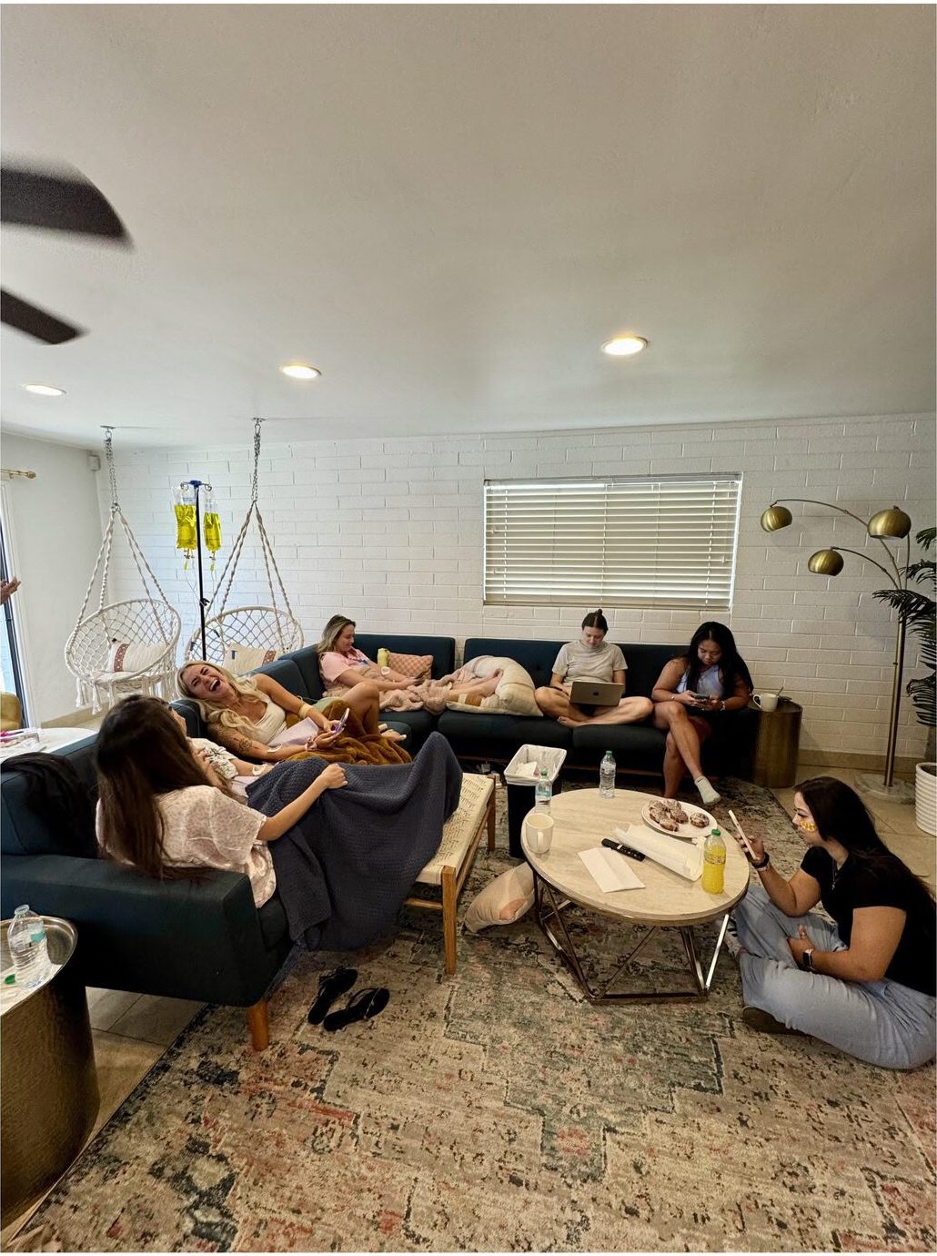 Friends getting IV drips together at home with a Zen IV Spa nurse